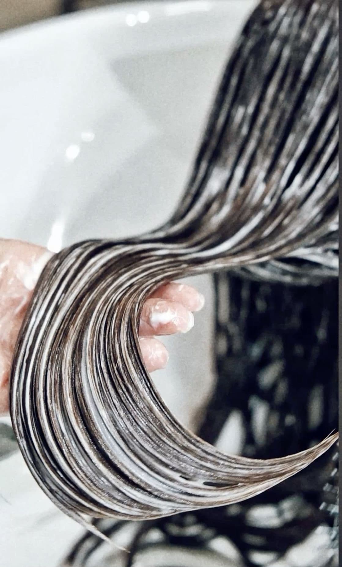 Toner being worked through wet hair